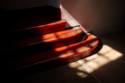 Sunlight on Red Steps